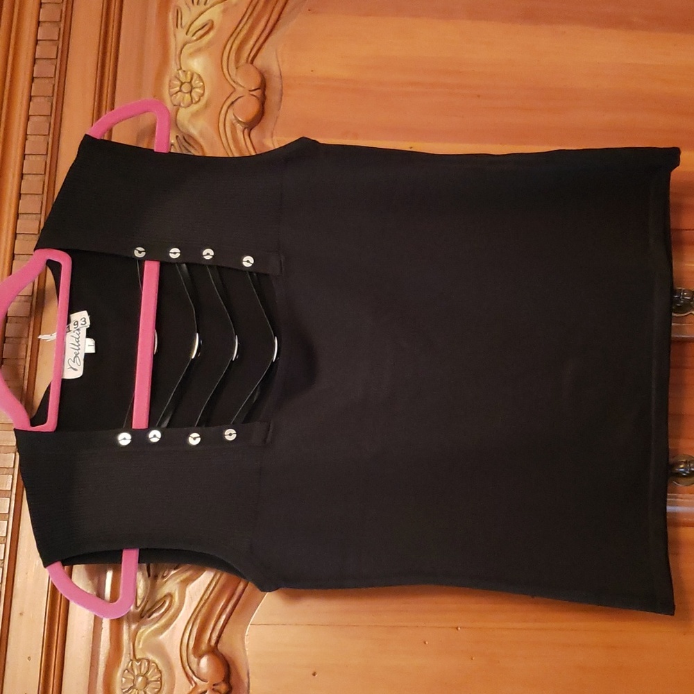 Ladies smooth knit sleeveless top with 5% spandex.